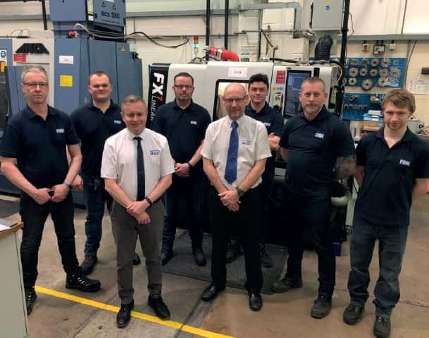 Group photo in Fenntool machine shop